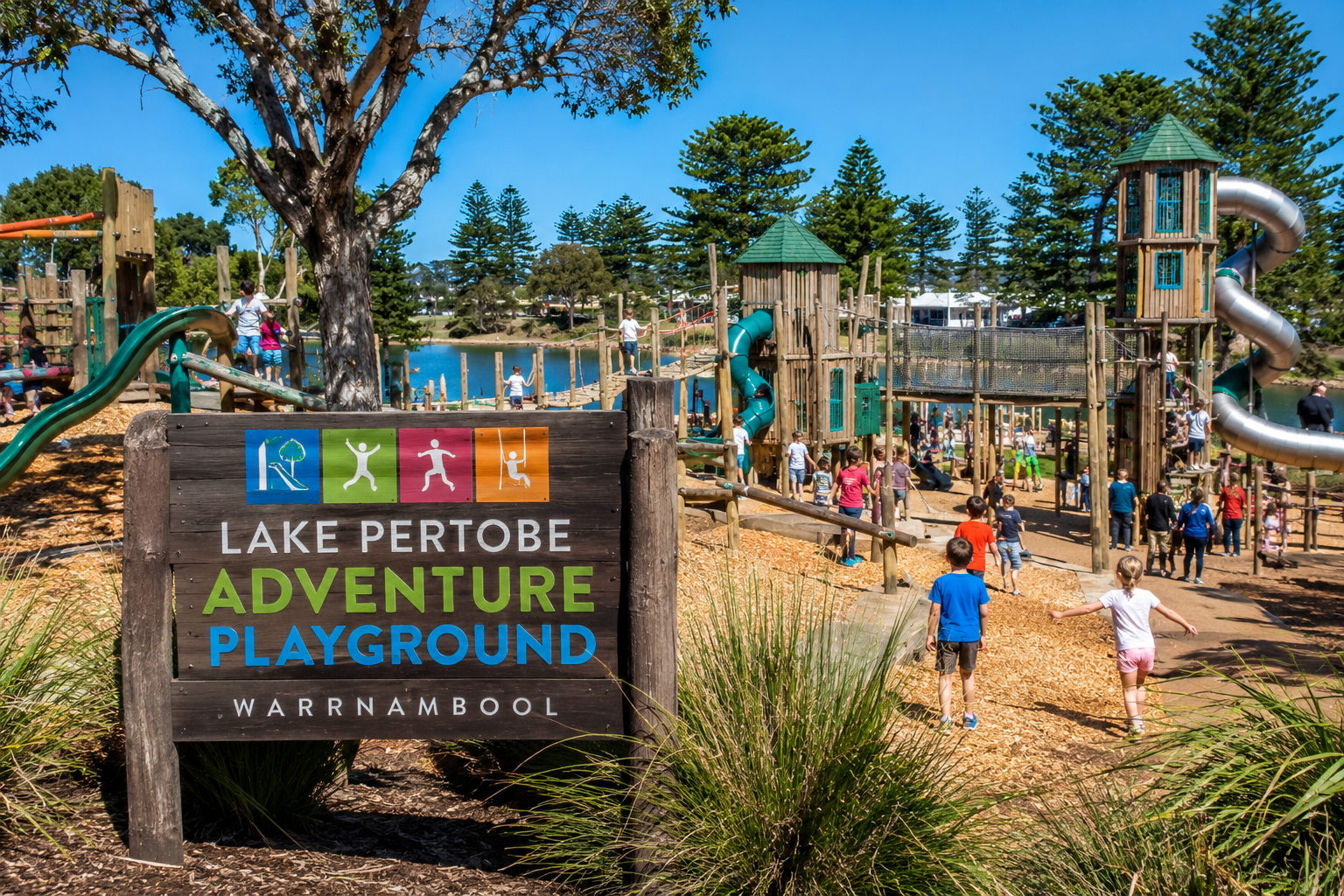 Lake Pertobe Adventure Playground in Warrnambool, Victoria, Australia, featuring large play structures, slides, climbing equipment, lakeside scenery, and family-friendly outdoor recreation areas.