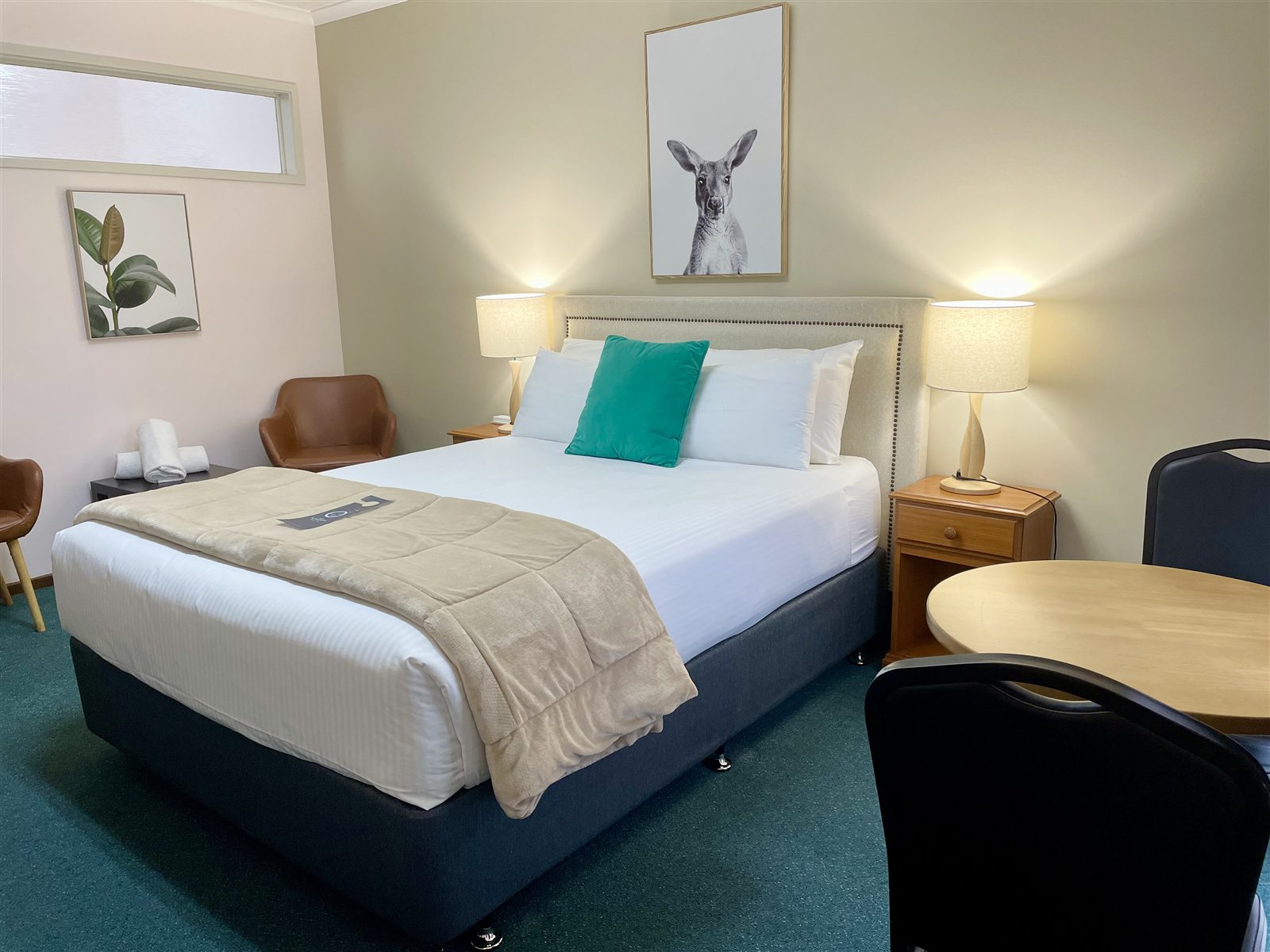 Queen Room at City Heart Motel Warrnambool with king bed, ensuite and comfortable seating